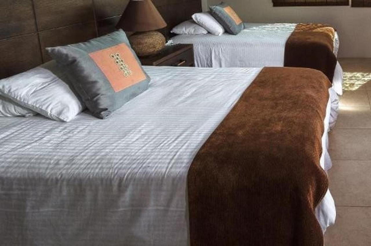 Iguana Crossing Boutique Hotel Puerto Villamil Eksteriør bilde