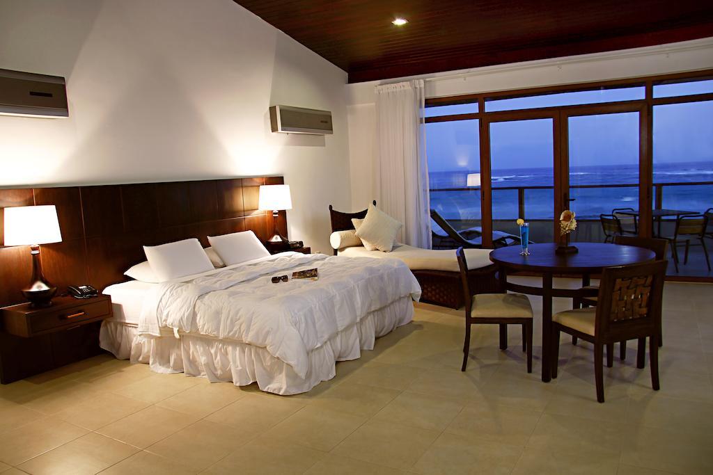 Iguana Crossing Boutique Hotel Puerto Villamil Rom bilde