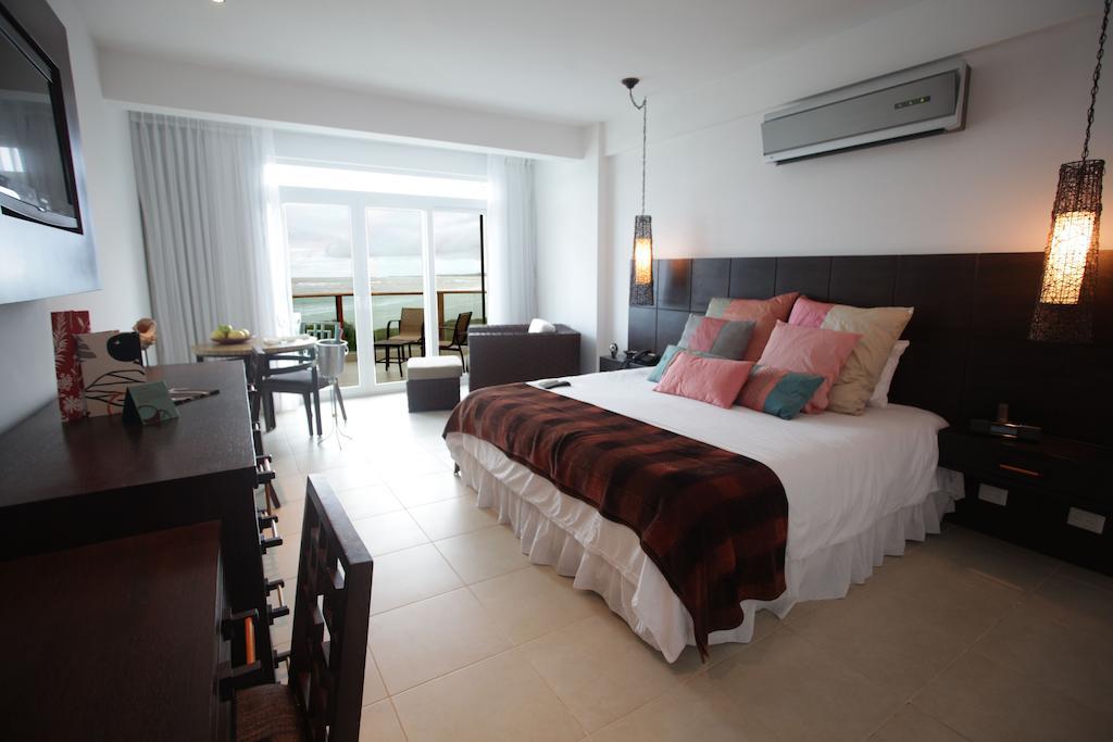 Iguana Crossing Boutique Hotel Puerto Villamil Rom bilde