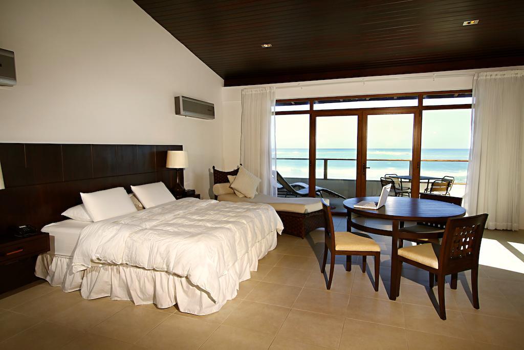 Iguana Crossing Boutique Hotel Puerto Villamil Rom bilde